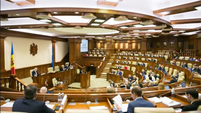 Proiectul privind repunerea limbii române în documentele oficiale, respins de PSRM și PDM