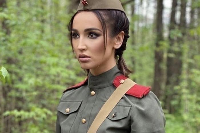 Бузову затравили в сети за фотосессию в военной форме