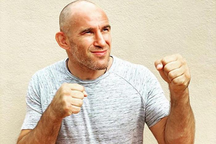 Российский боец UFC Олейник объяснил желание остаться в США