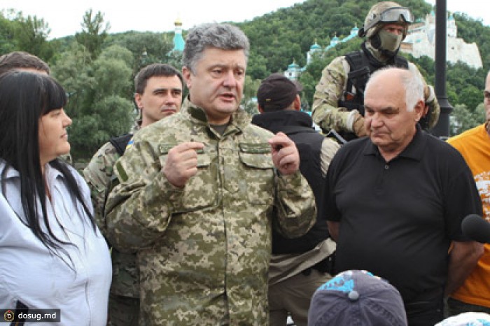 Порошенко одобрил отказ Путина от использования войск на Украине