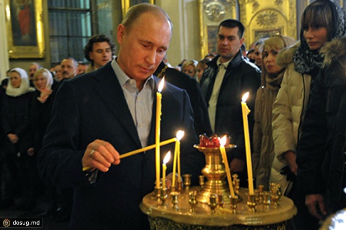 Путин поставил свечки за защитников «людей Новороссии»