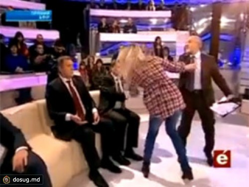 Соратник Януковича сцепился с активисткой FEMEN