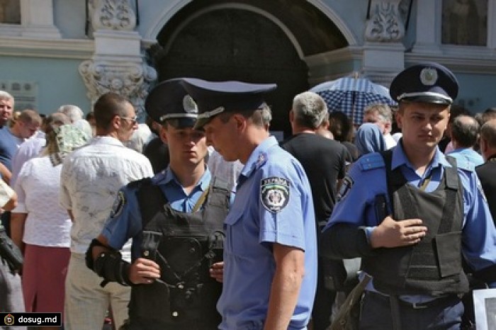 В Киеве неизвестные выстрелили в голову православному священнику